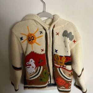 appliqué sweater